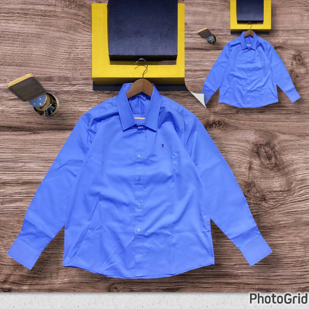 Blue button down shirt with platnum logo office wear