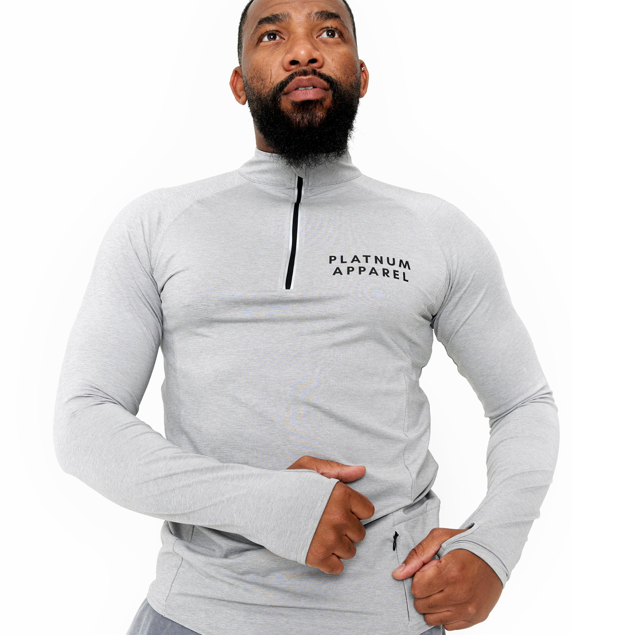 Gray long sleeve Stirrup shirt with high collar and zipper. Unisex outfit. Running clothes. Fitness outfit